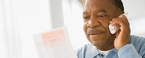 senior man on a call with a Medicare expert